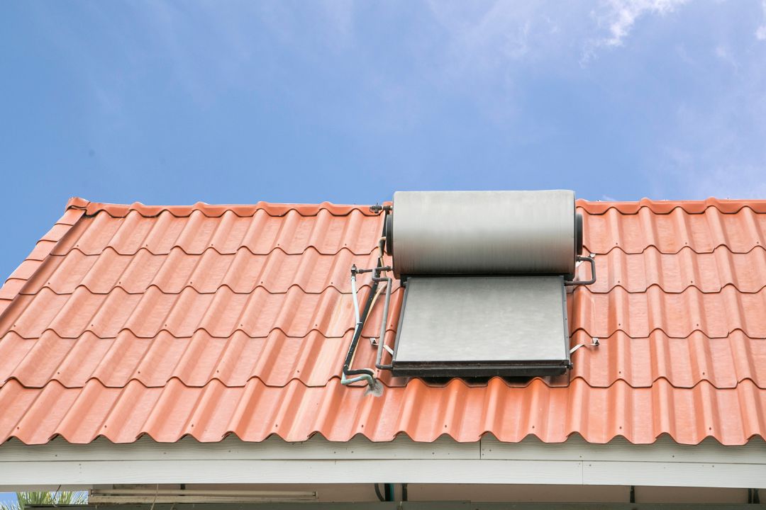 Energy-efficient solar hot water system equipped on a Cannonvale home, integrating seamlessly with the roof to provide sustainable hot water solutions, emphasizing maintenance ease and climate adaptability.